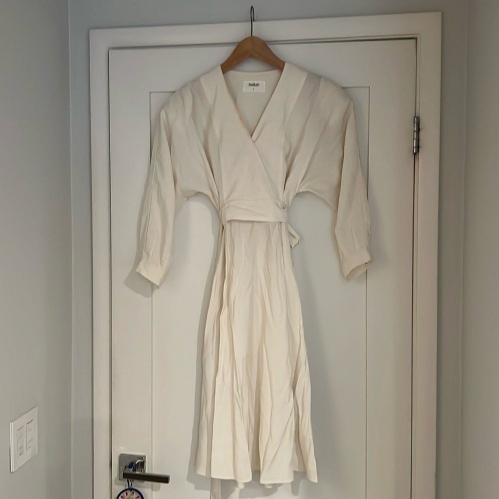 White woman’s tie waist dress